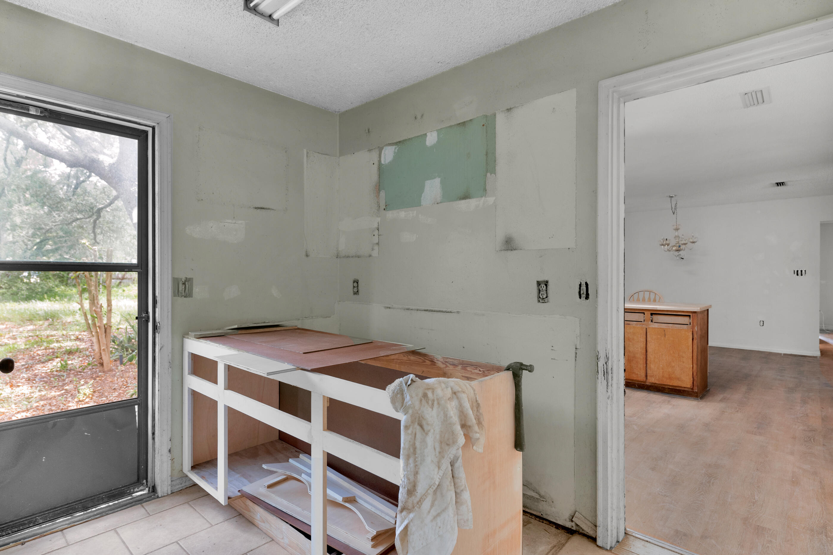 8156 4th Street Navarre, FL 32566 - Photo 16 of 23 a bedroom with a bed and a window