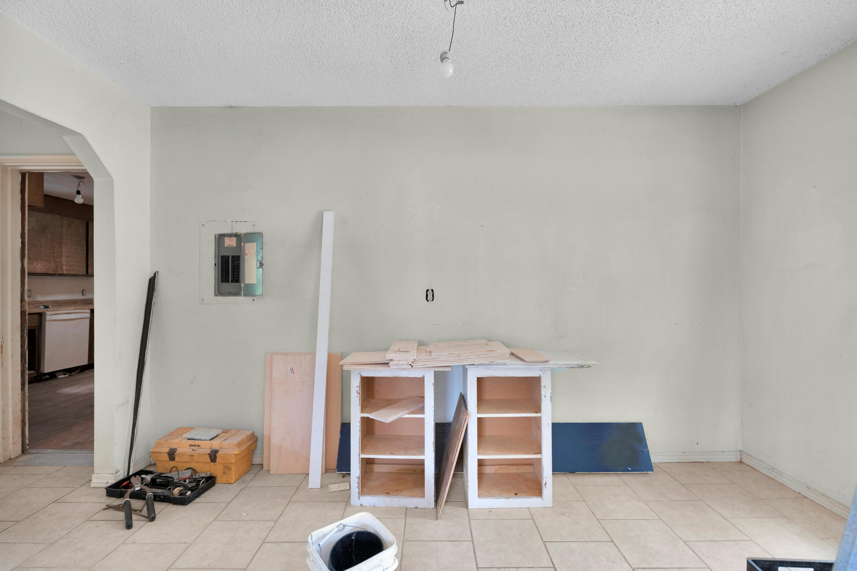 8156 4th Street Navarre, FL 32566 - Photo 18 of 23 a room with furniture a rug and white walls