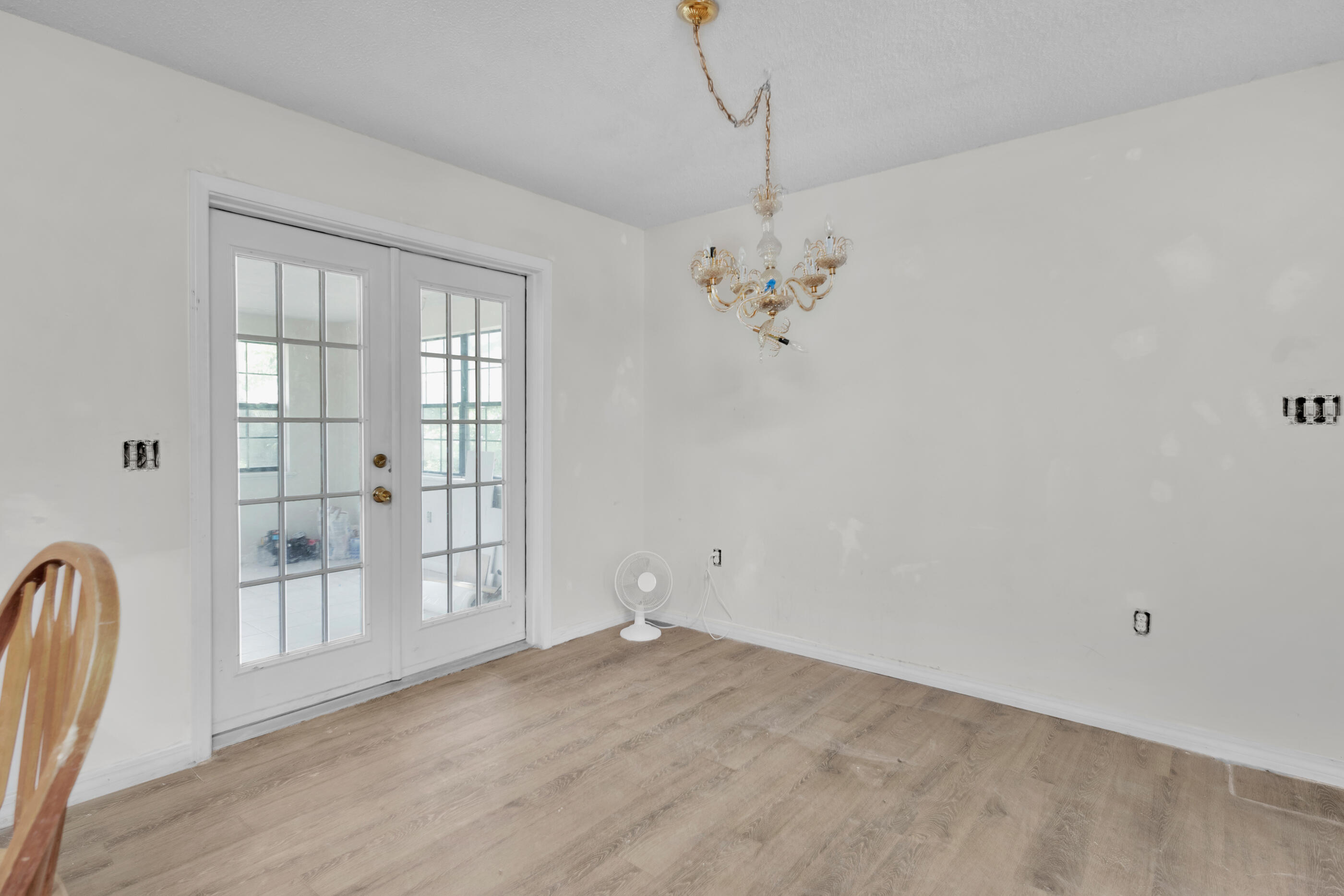 8156 4th Street Navarre, FL 32566 - Photo 7 of 23 a view of an empty room with a window