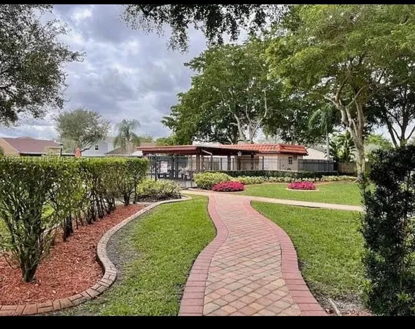 a view of a house with garden