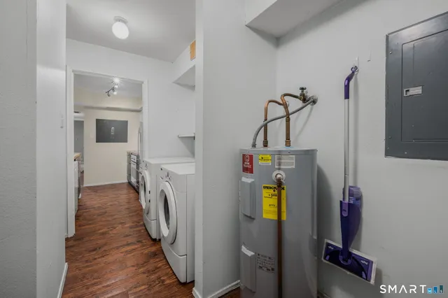 a view of hallway with washer and dryer