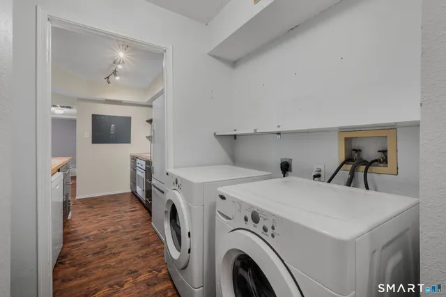 a view of livingroom with washer and dryer