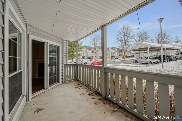 a city view with tall buildings and a yard