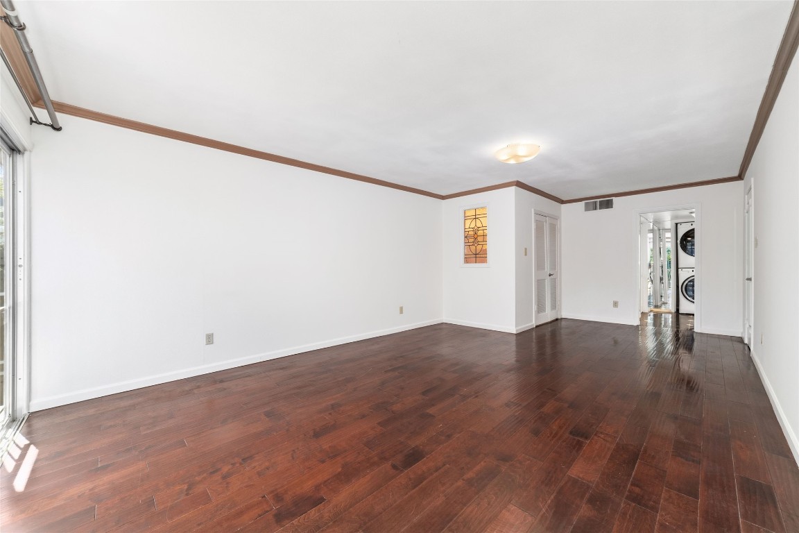 5050 Ambassador Way, Unit 309 Houston, TX 77056 - Photo 29 of 42 a view of empty room with wooden floor