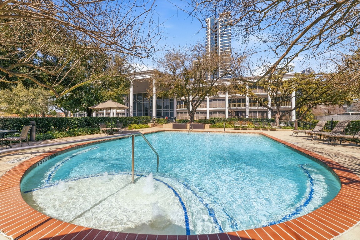 5050 Ambassador Way, Unit 309 Houston, TX 77056 - Photo 40 of 42 swimming pool view with a outdoor seating
