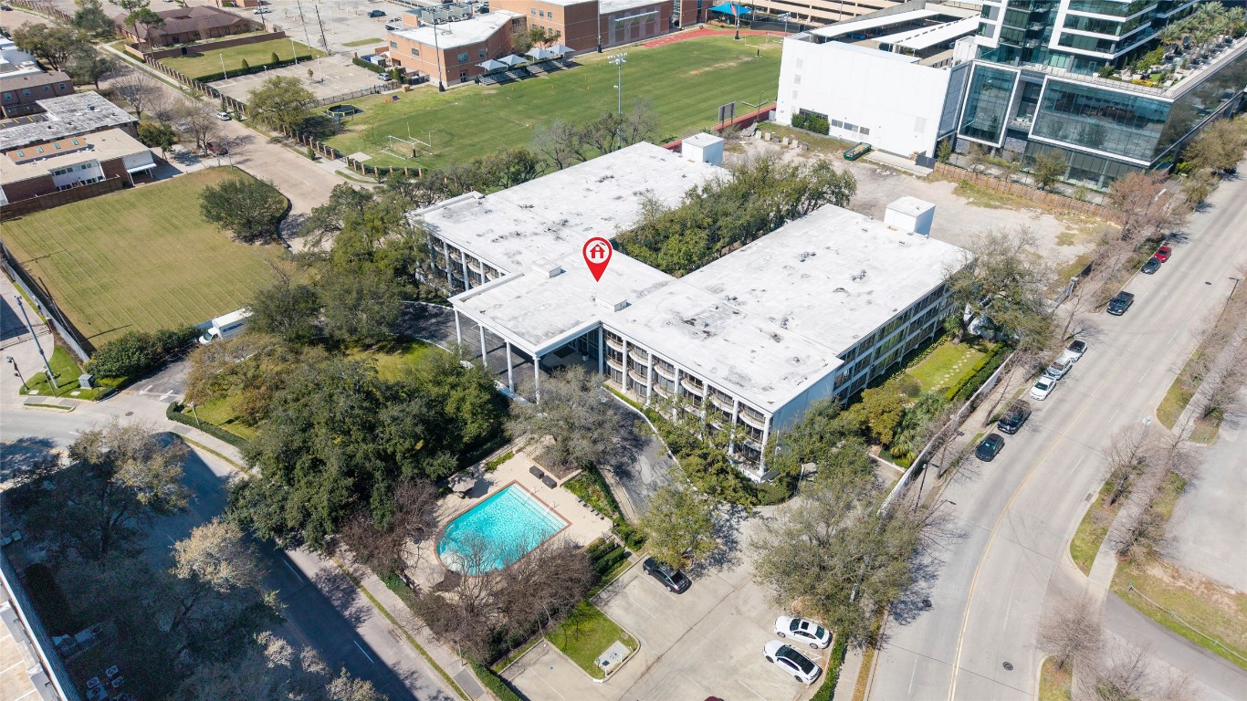 5050 Ambassador Way, Unit 309 Houston, TX 77056 - Photo 42 of 42 an aerial view of a house with a yard