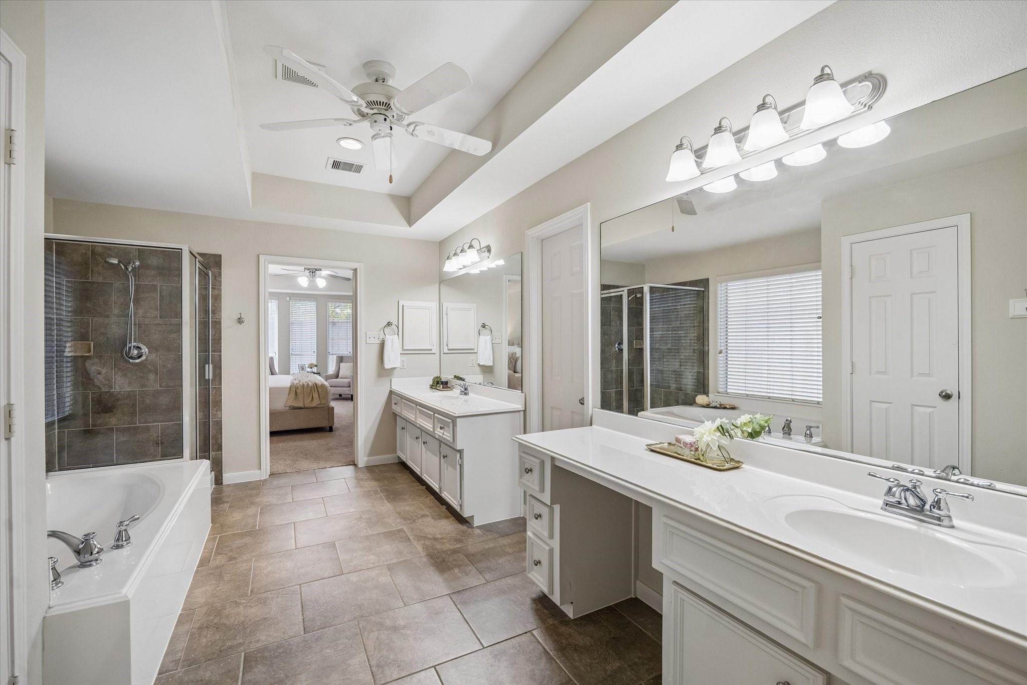 25827 Austin Springs Spring, TX 77373 - Photo 16 of 34 Primary bathroom with both soaking tub and stand up shower along with separated dual vanity