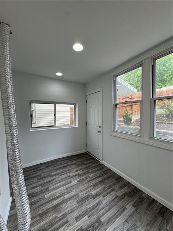 2422 Salisbury Street Pittsburgh, PA 15210 - Photo 5 of 13 an empty room with wooden floor and windows