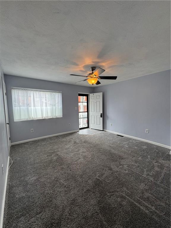 2422 Salisbury Street Pittsburgh, PA 15210 - Photo 6 of 13 a view of an empty room with windows