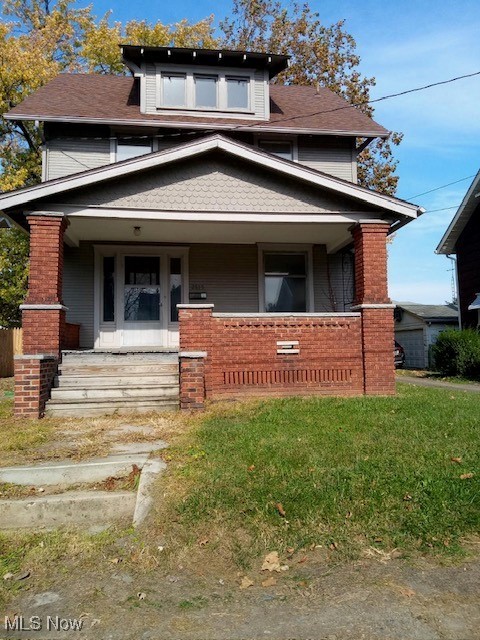 2615 9th Street Northwest Canton, OH 44708 - Photo 1 of 1 View of front of home with a front lawn and a porch