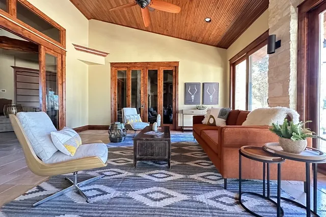 a view of a dining room with furniture window and outside view