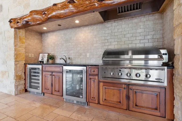 a spacious bedroom with a bed and large windows