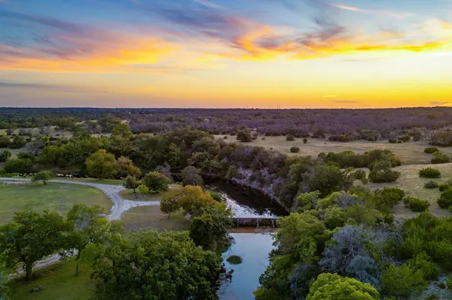 a view of a city with mountains in the background