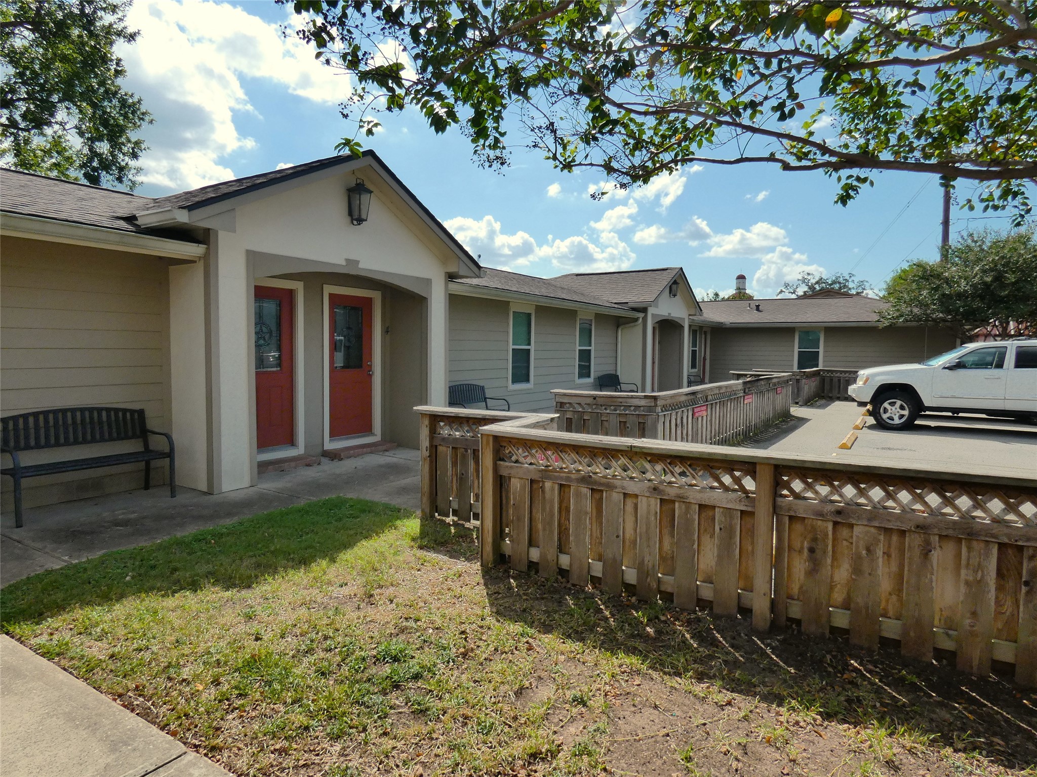 507 Houston Street, Unit 4 Rosenberg, TX 77471 - Photo 2 of 27 front view of a house with a yard