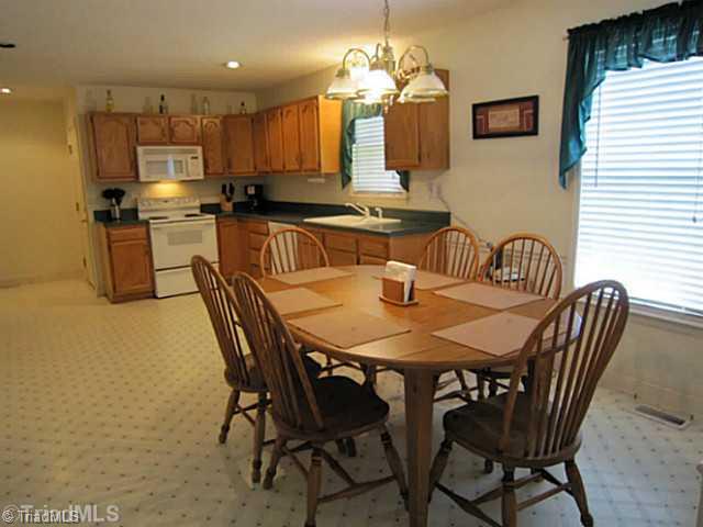 4930 Springhouse Farm Road Winston-Salem, NC 27107 - Photo 4 of 13 Dining Room. KITCHEN & DINING - Over looking front yard.