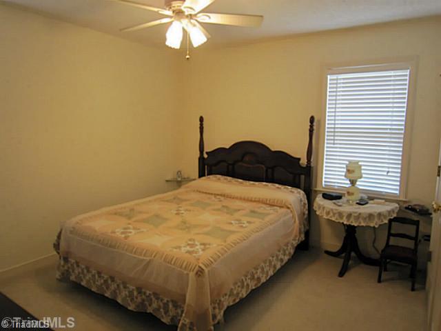4930 Springhouse Farm Road Winston-Salem, NC 27107 - Photo 8 of 13 2nd Bedroom. SECOND BEDROOM- Windows on both sides.