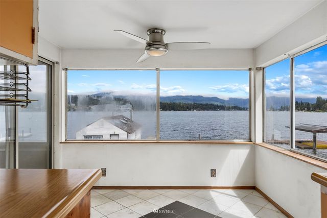 a view of a kitchen with a window