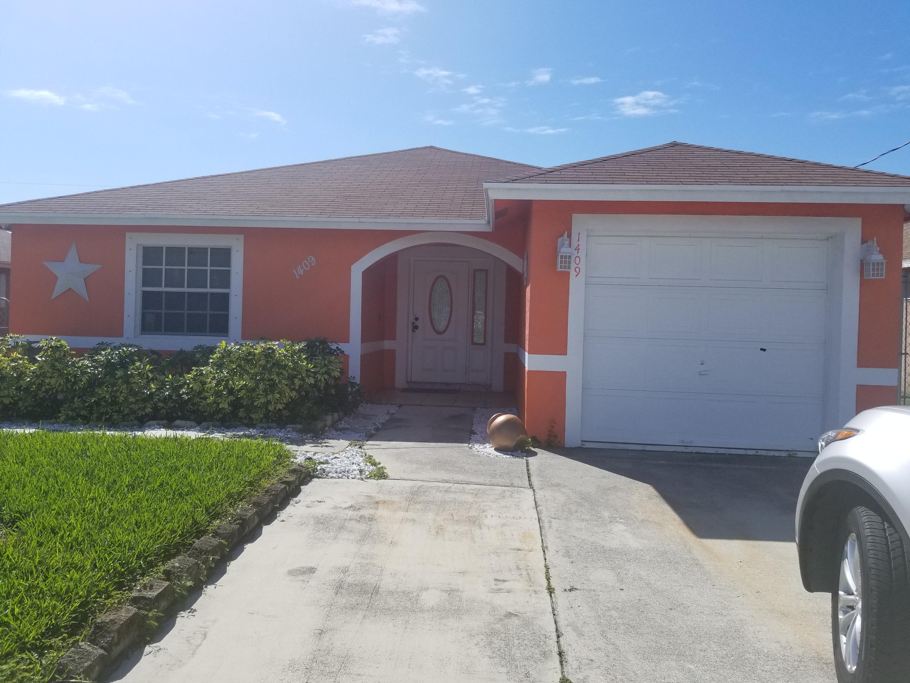 1409 West 35th Street Riviera Beach, FL 33404 - Photo 1 of 1 FRONT
