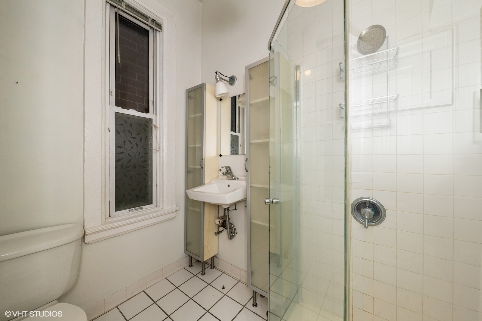 1729 West Erie Street, Unit 3N Chicago, IL 60622 - Photo 11 of 11 a bathroom with a shower toilet and sink