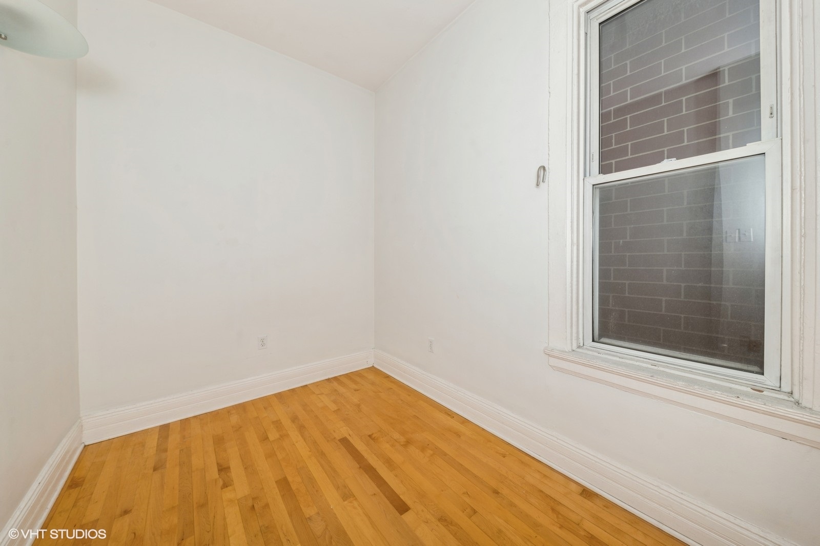 1729 West Erie Street, Unit 3N Chicago, IL 60622 - Photo 9 of 11 a view of a room that has a window