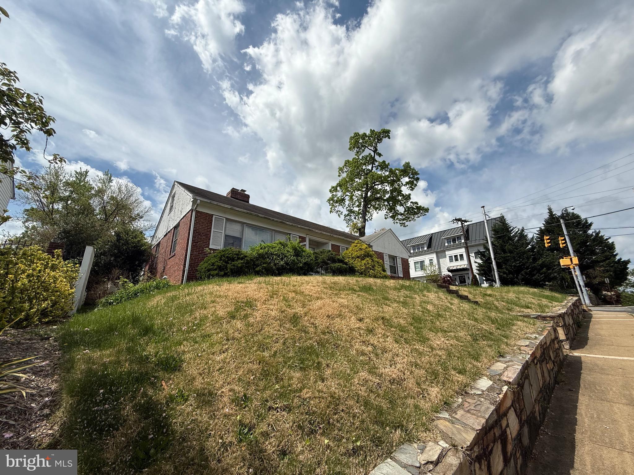 2846 Lorcom Lane Arlington, VA 22201 - Photo 3 of 8 a front view of a house with garden