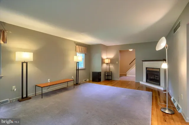 a view of a livingroom with a fireplace