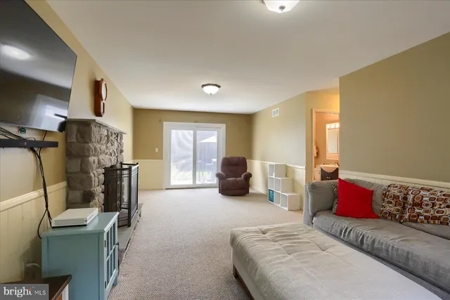 a bedroom with furniture and a couch