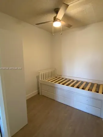 a living room with furniture window and a table