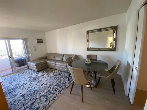 a living room with furniture and a gate