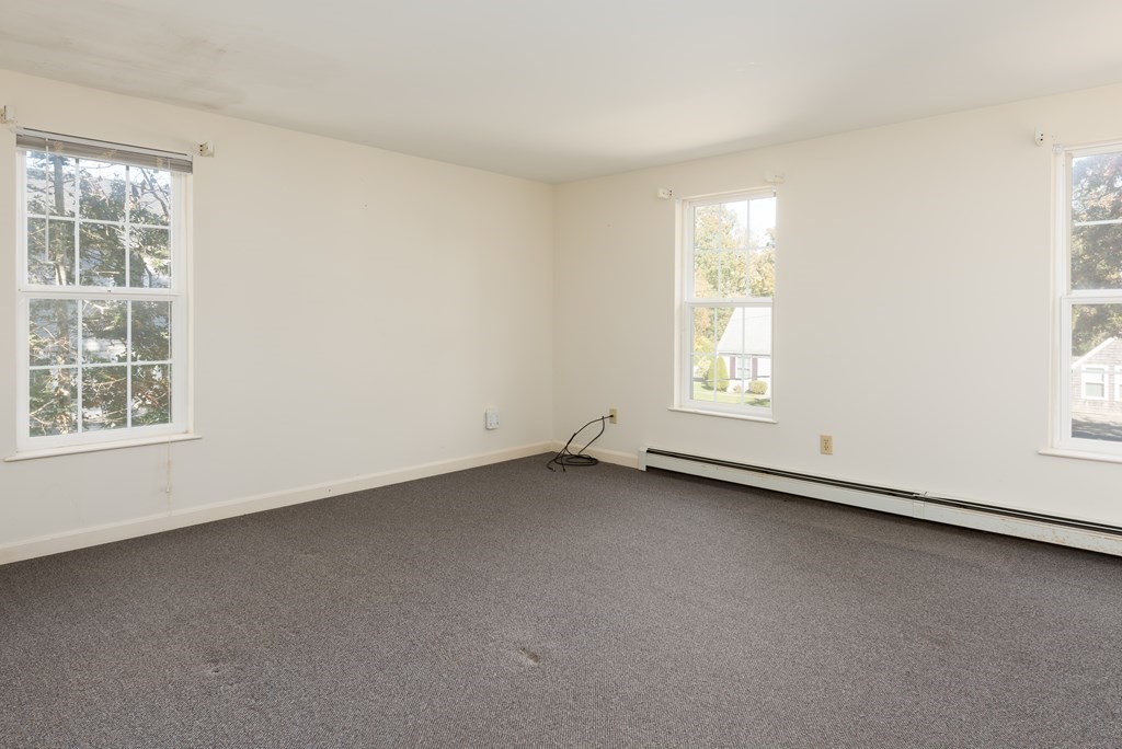 47 Webster Road Yarmouth, MA 02673 - Photo 12 of 19 an empty room with a window