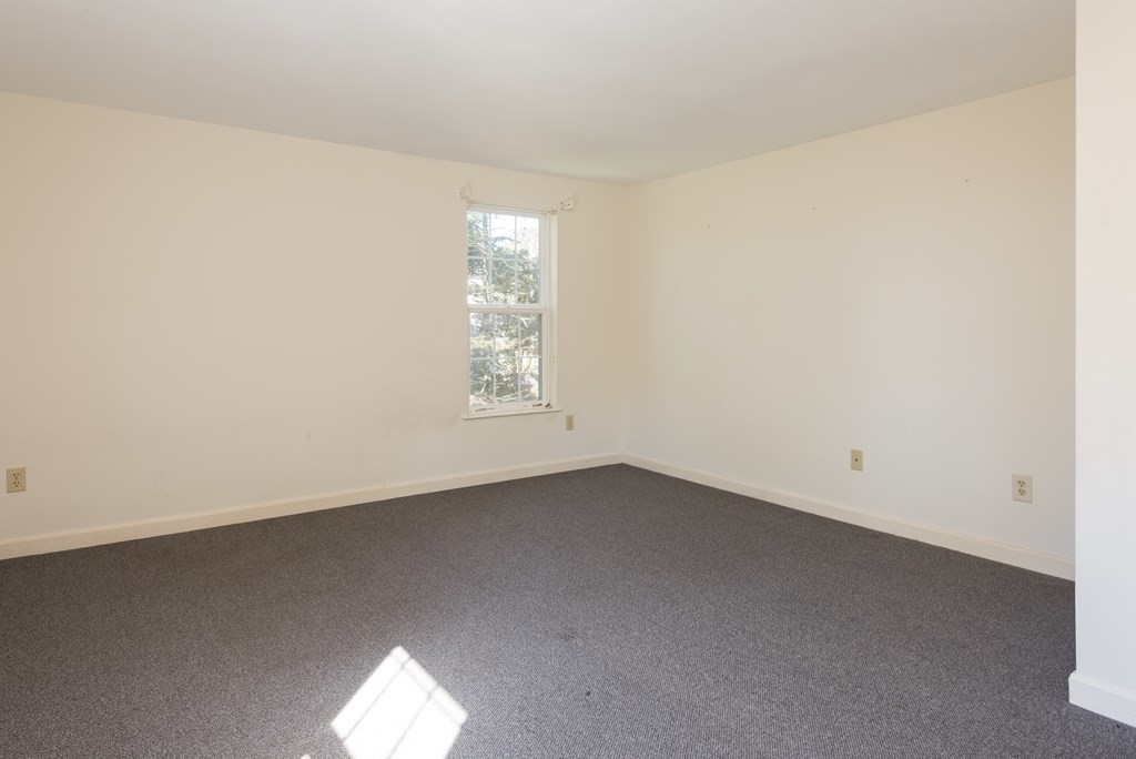 47 Webster Road Yarmouth, MA 02673 - Photo 13 of 19 an empty room with a window