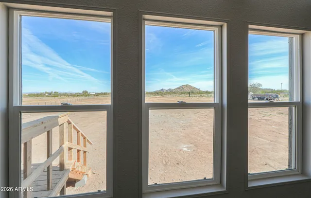 a view of a glass door with a large window