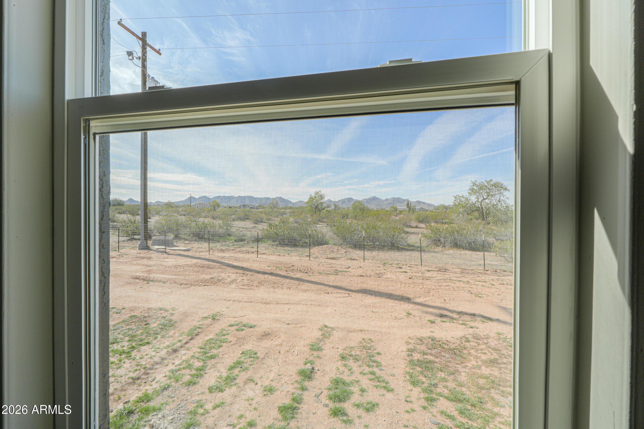 161 North Pueblo Road Maricopa, AZ 85139 - Photo 31 of 76 a view of a room with a window