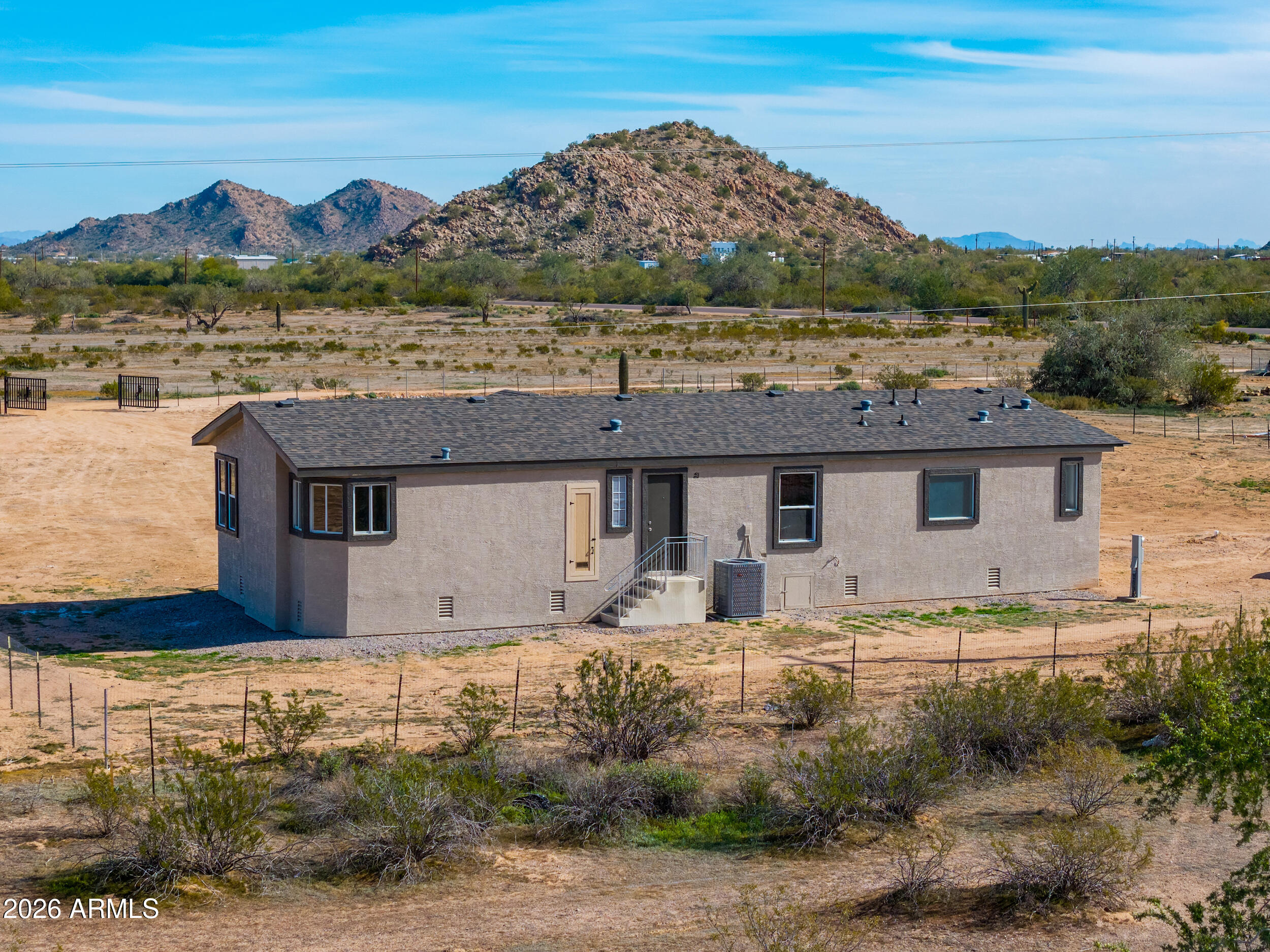 161 North Pueblo Road Maricopa, AZ 85139 - Photo 52 of 76 a view of a house with a outdoor space