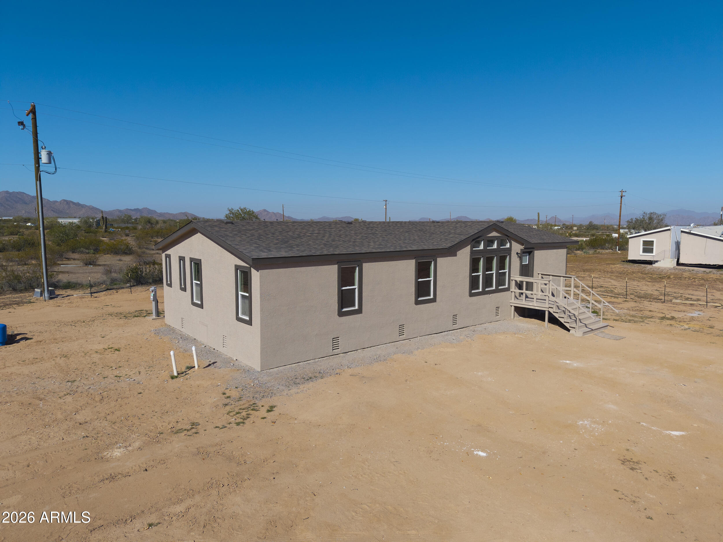 161 North Pueblo Road Maricopa, AZ 85139 - Photo 75 of 76 a house with a outdoor space