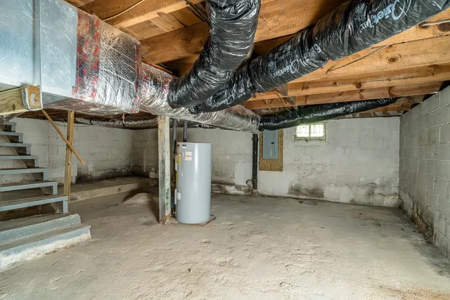 a view of a garage with wooden wall