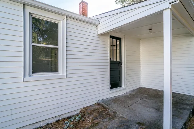 a view of front door and porch