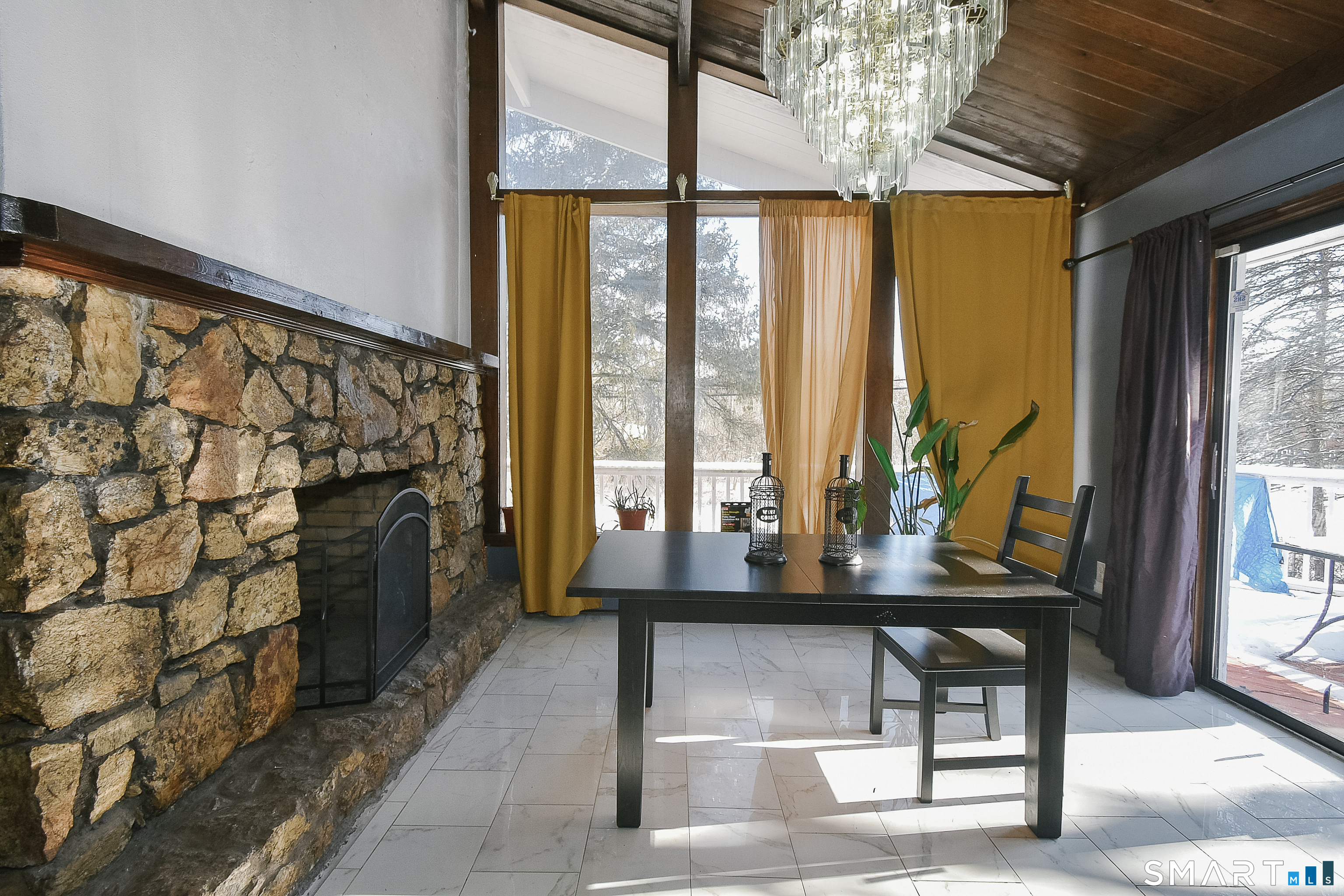 63 Millbrook Road Middletown, CT 06457 - Photo 12 of 29 a view of a entryway with furniture and a porch