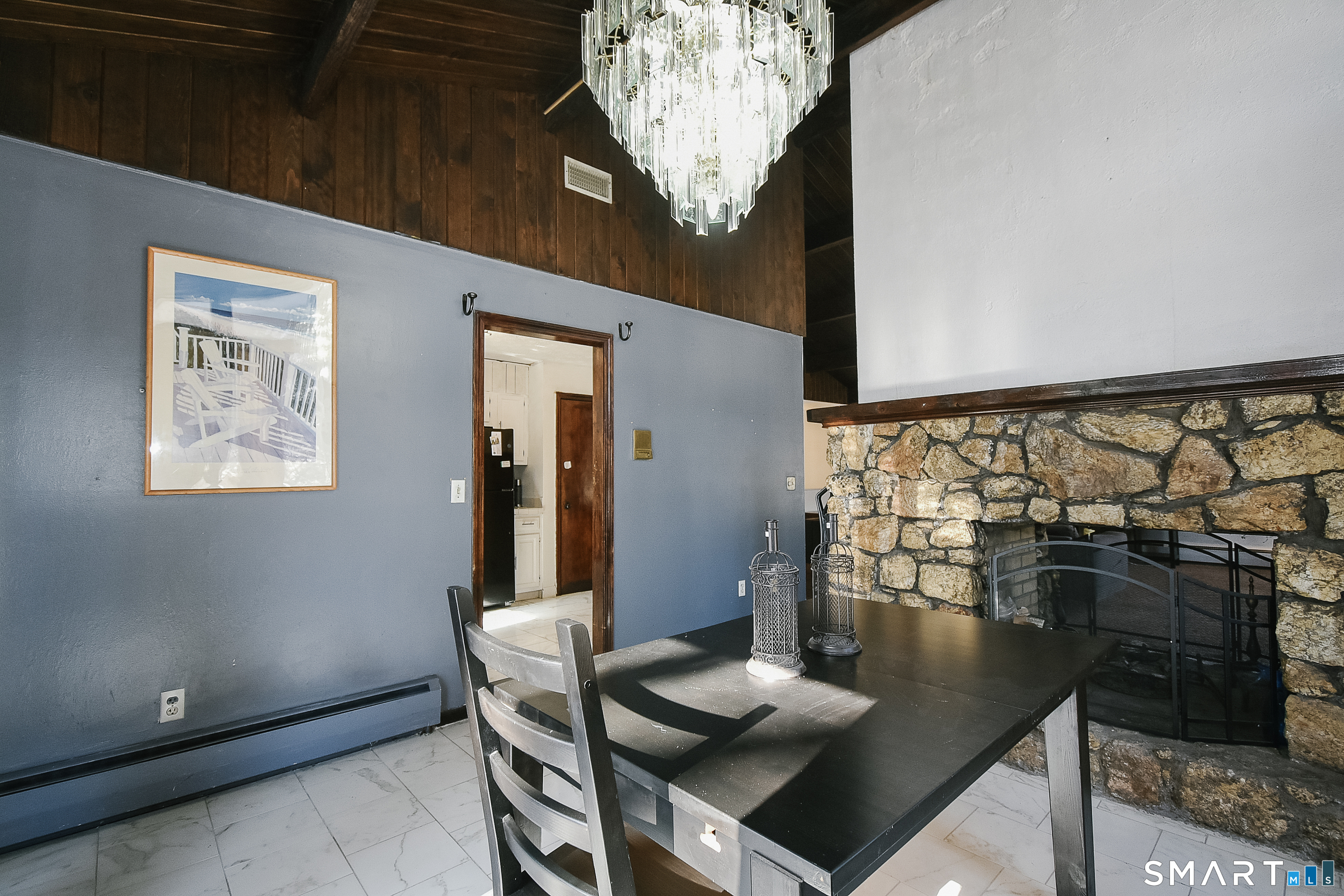 63 Millbrook Road Middletown, CT 06457 - Photo 14 of 29 a view of a dining room with furniture and wooden floor
