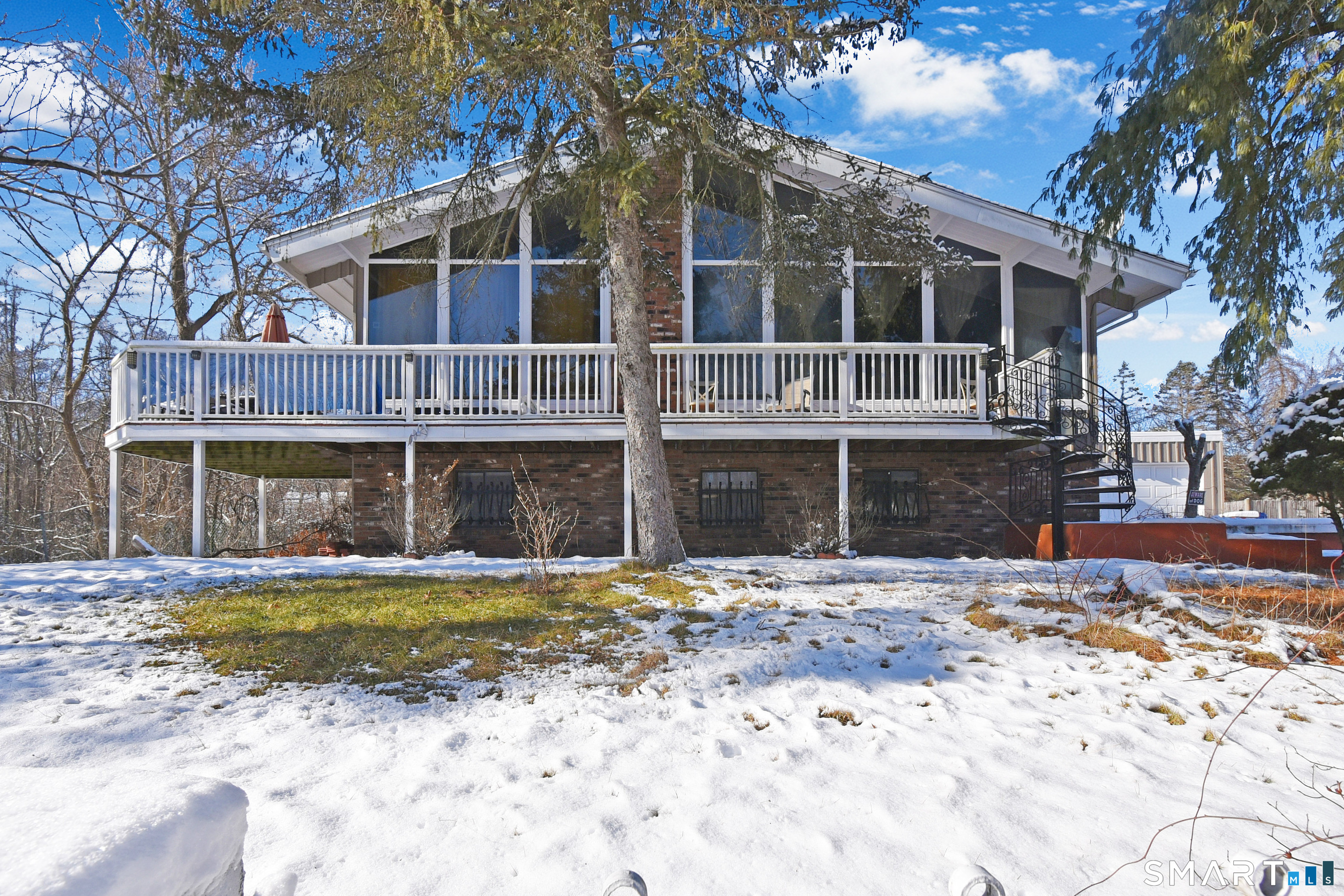 63 Millbrook Road Middletown, CT 06457 - Photo 2 of 29 a view of a house with a yard