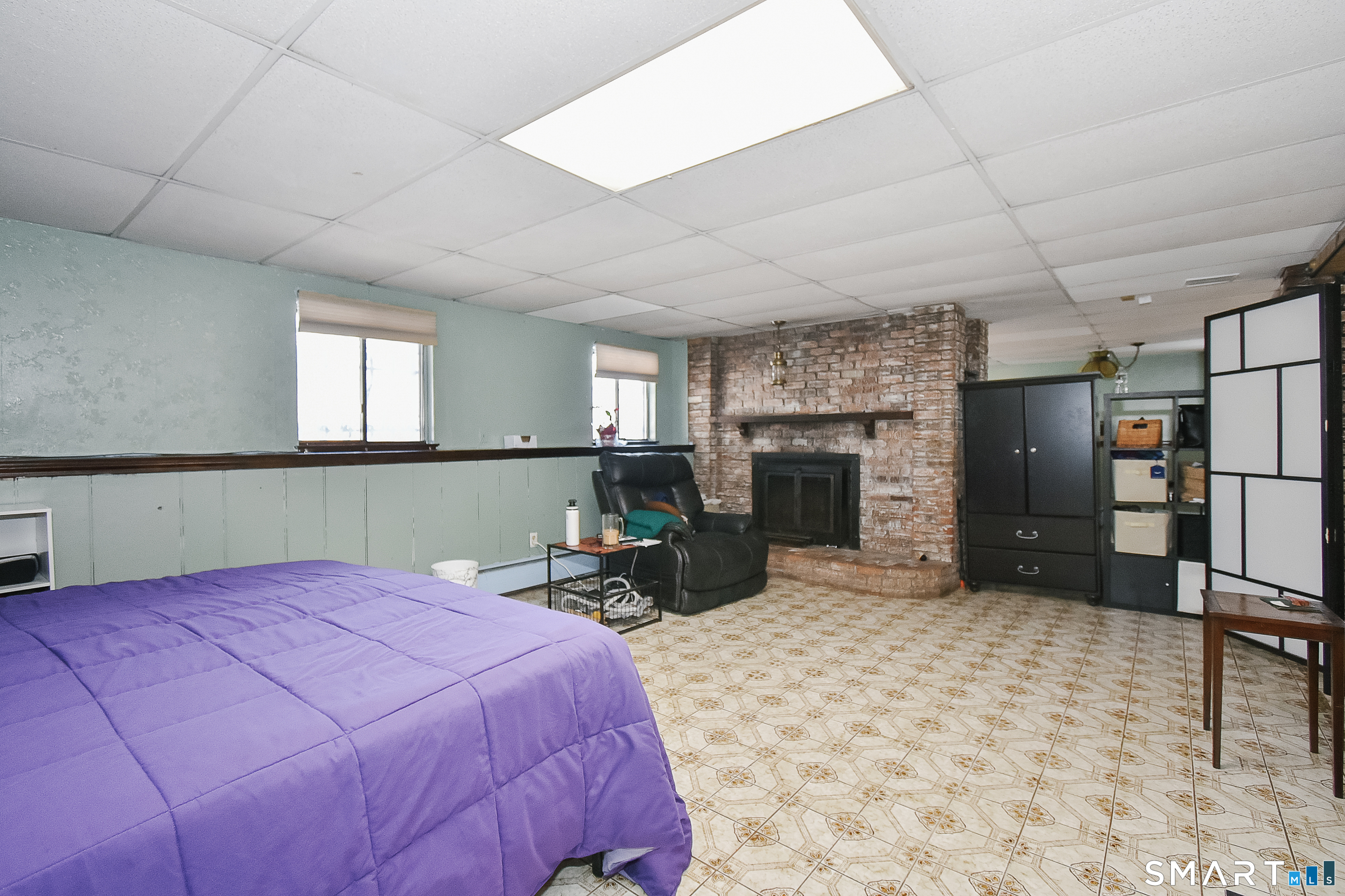63 Millbrook Road Middletown, CT 06457 - Photo 27 of 29 a bed room with a bed and a television