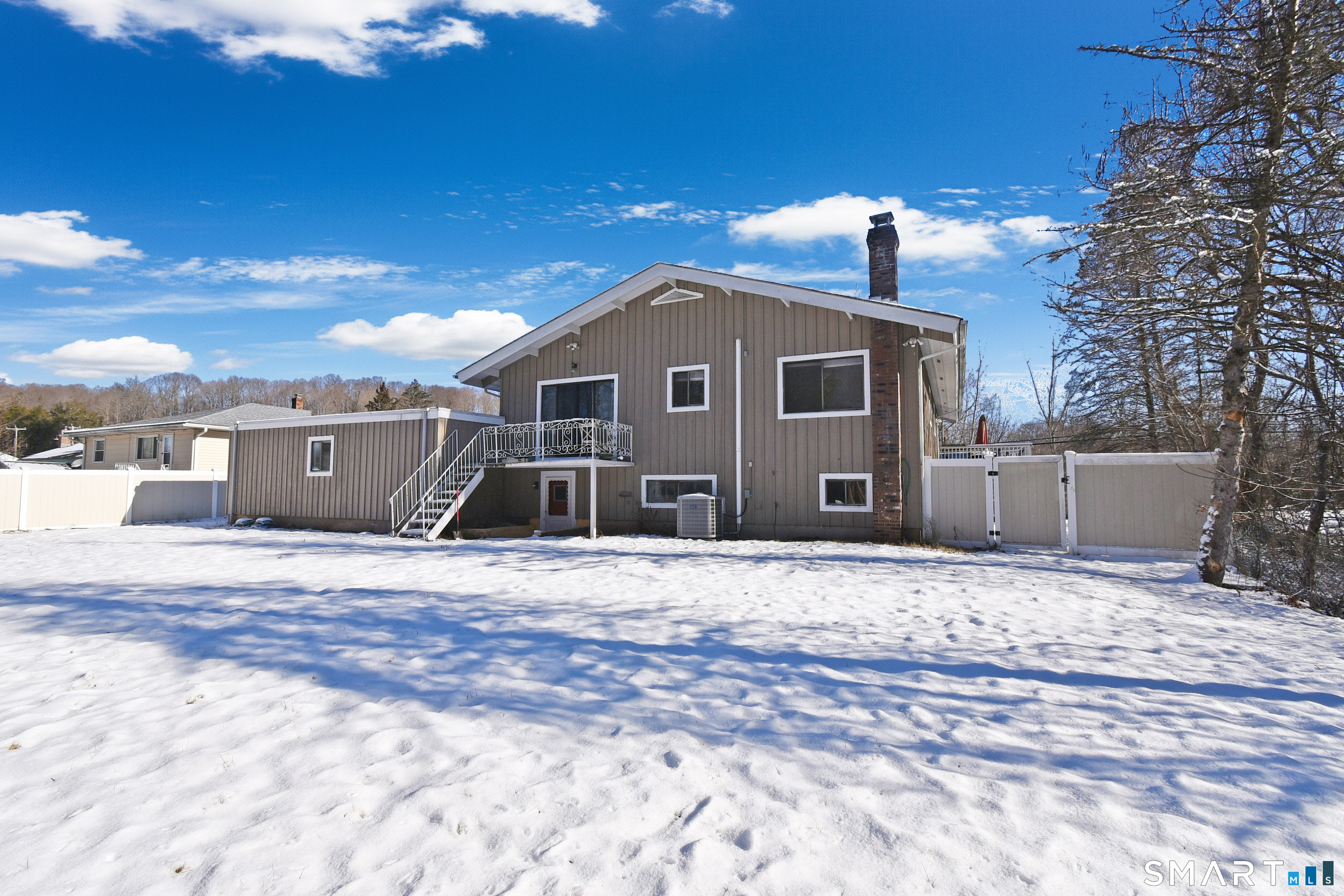 63 Millbrook Road Middletown, CT 06457 - Photo 5 of 29 a front view of a house with a yard