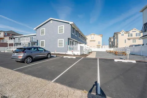 a view of a car parked in front of a building