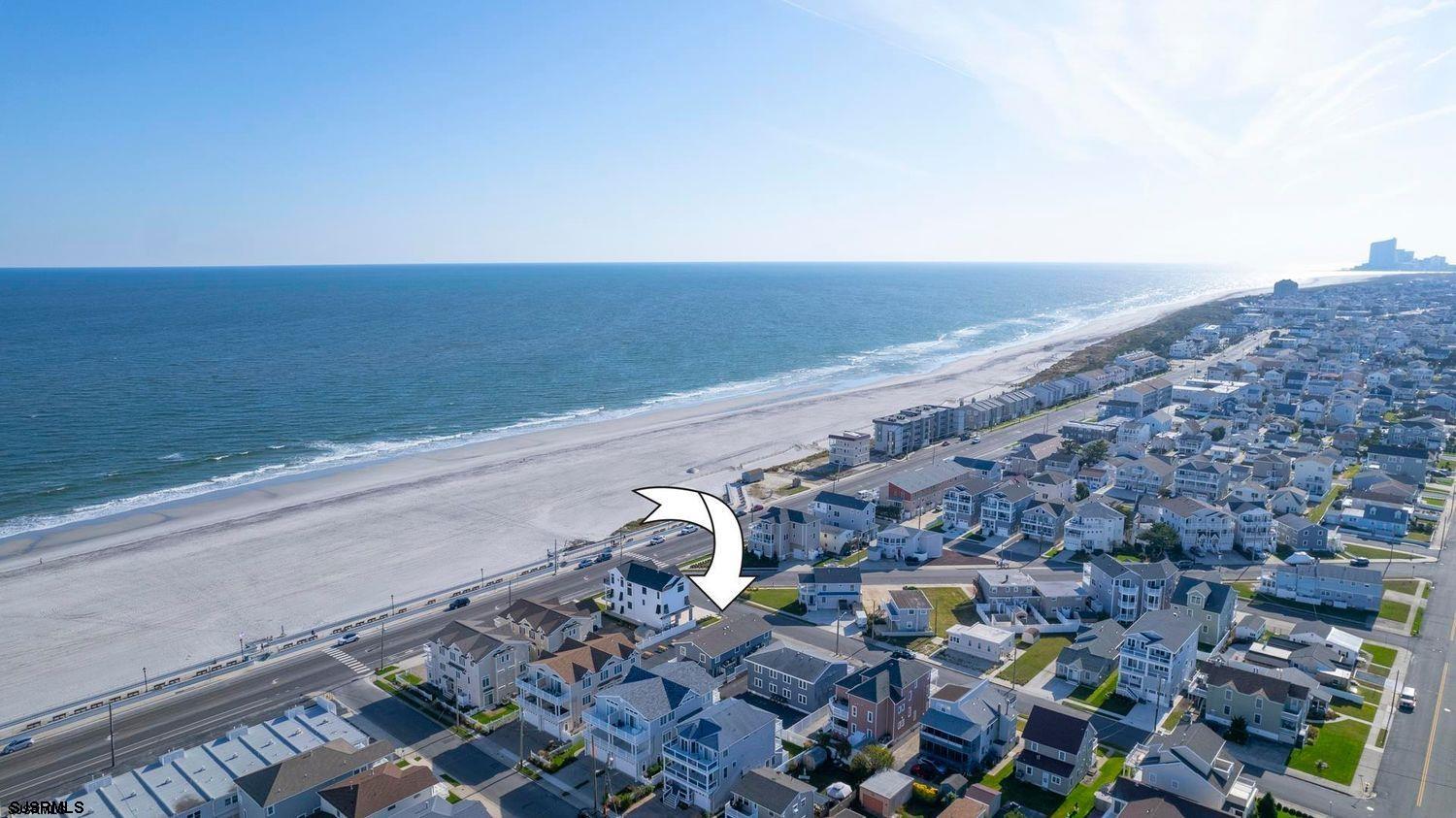 229 10th Street North, Unit 2 Brigantine, NJ 08203 - Photo 22 of 27 a view of an outdoor space with seating area