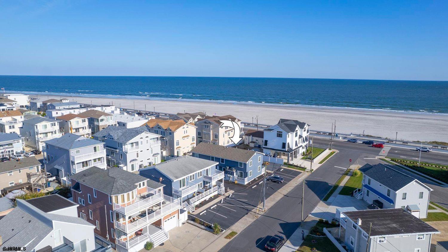 229 10th Street North, Unit 2 Brigantine, NJ 08203 - Photo 23 of 27 an aerial view of a livingroom with chairs and a table