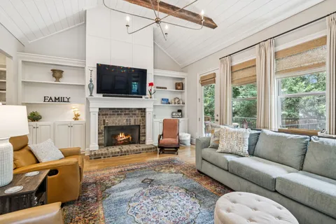 a bedroom with a bed and a cabinets