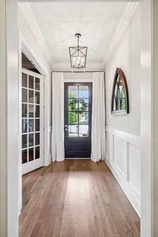 a dining room with granite countertop a table and chairs