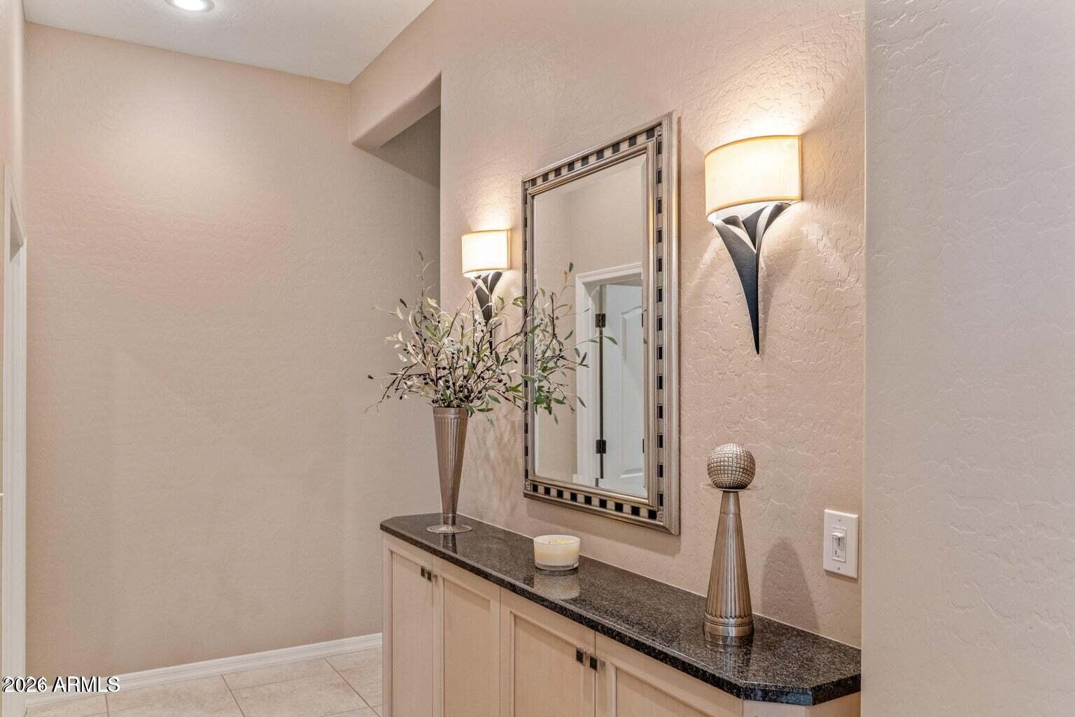 26601 North Aguila Road Rio Verde, AZ 85263 - Photo 24 of 45 a vase of flowers sitting on a table