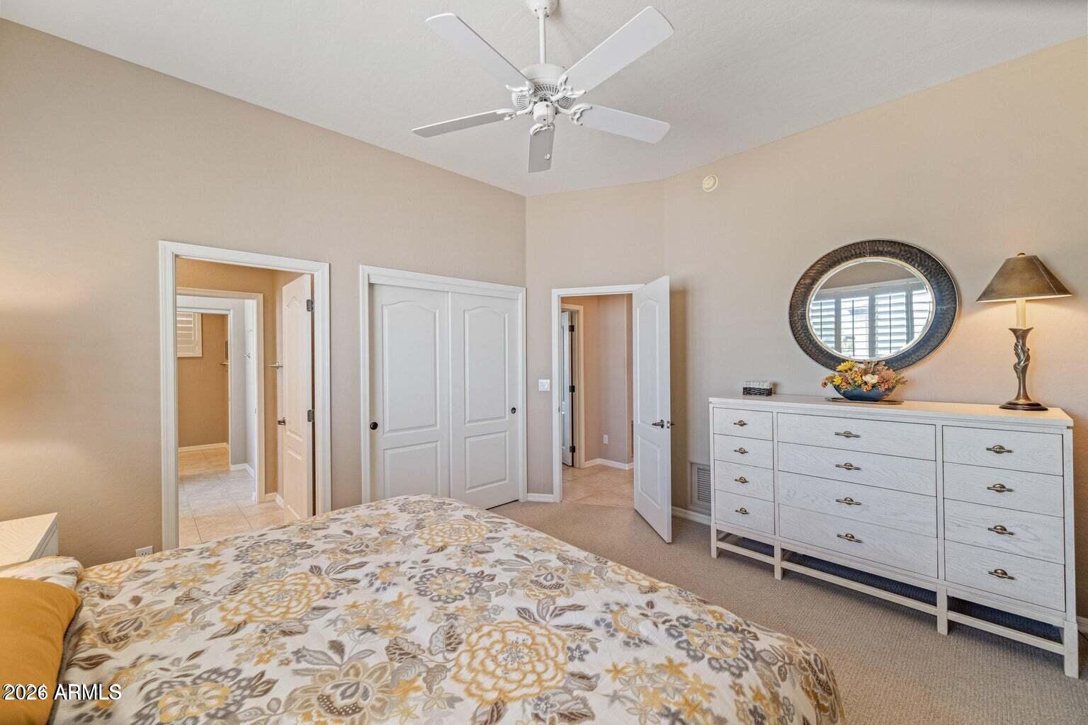 26601 North Aguila Road Rio Verde, AZ 85263 - Photo 26 of 45 a bedroom with a bed and a dresser