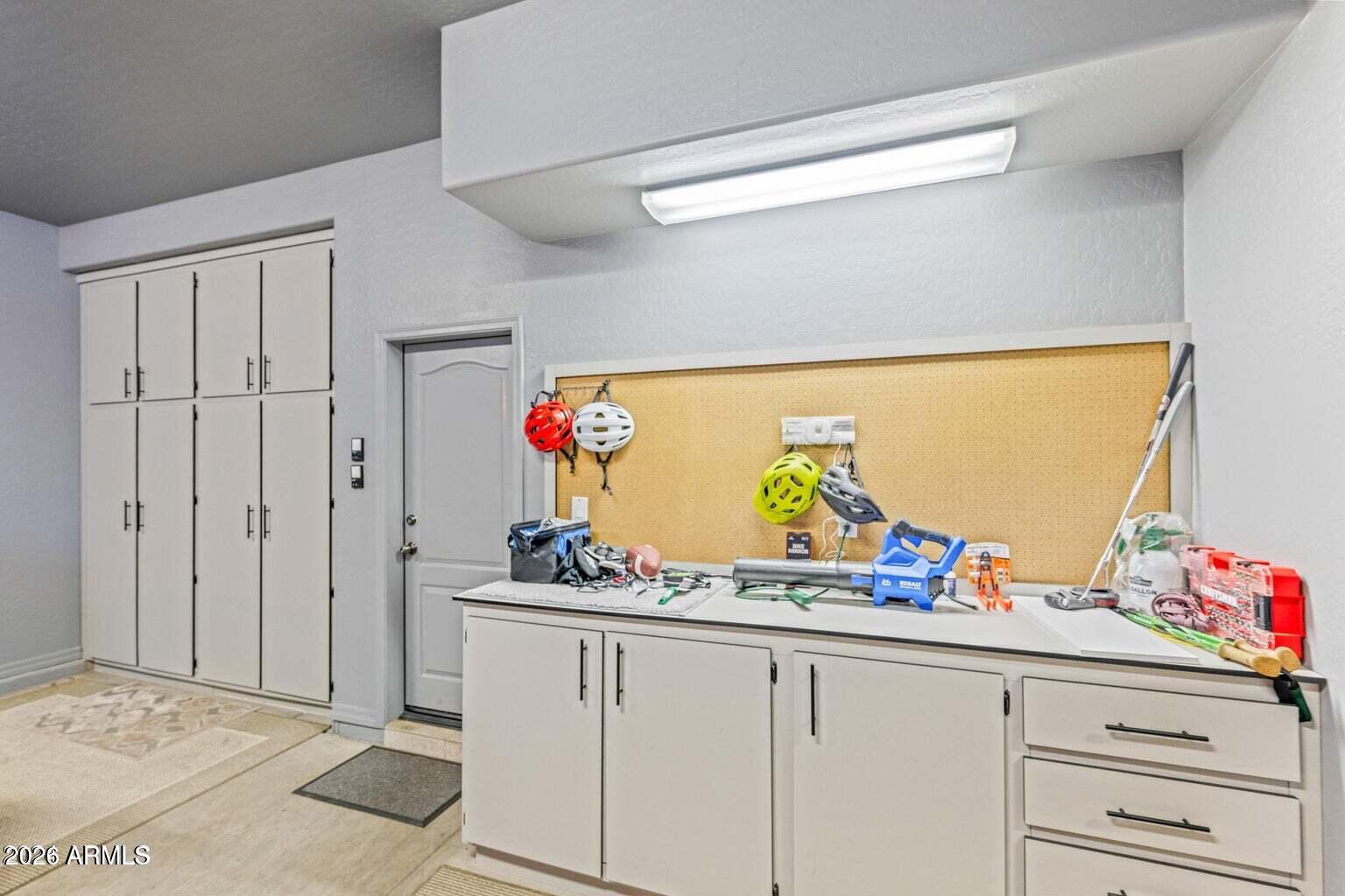 26601 North Aguila Road Rio Verde, AZ 85263 - Photo 33 of 45 a view of a storage and utility room
